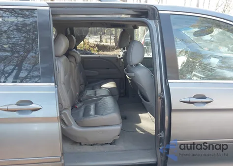 2010 Honda Odyssey Ex-L z USA, uszkodzony, nr VIN 5FNRL3H71AB099707